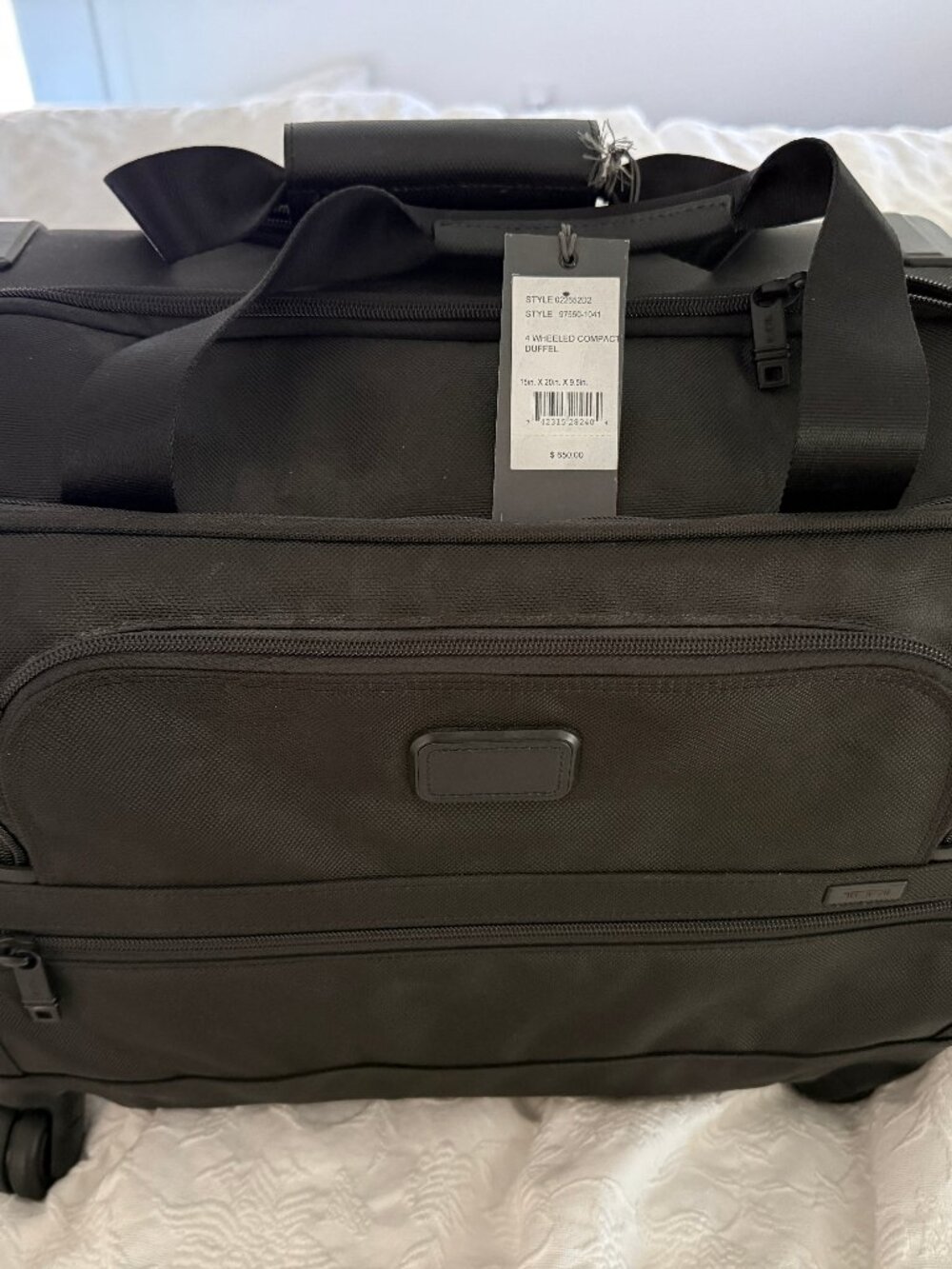 Tumi 4 wheel compact duffel